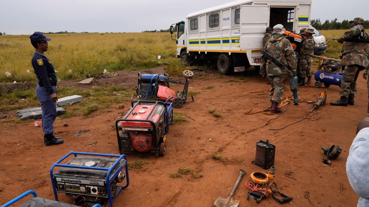 South African soldiers destroy illegal mining operations near Johannesburg as miners flee